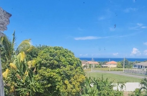 Priory House | Relax in Tropical Paradise Villa with Family-Friendly Amenities