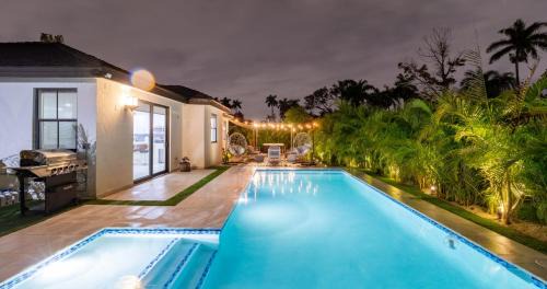 Golden Glades Villa | Idyllic Tropical Villa with Jacuzzi & Oceanfront Terrace