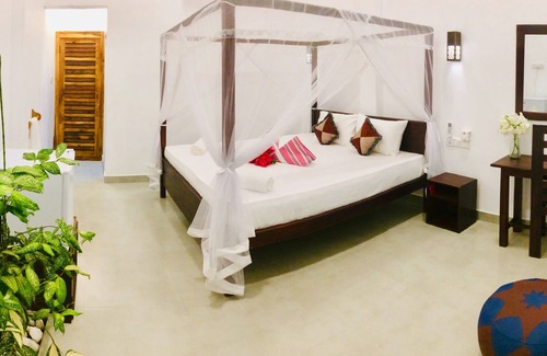 Pottuvil Division 2 Bed & Breakfast | Cozy Tropicana Homestay: Family-Friendly with Breakfast