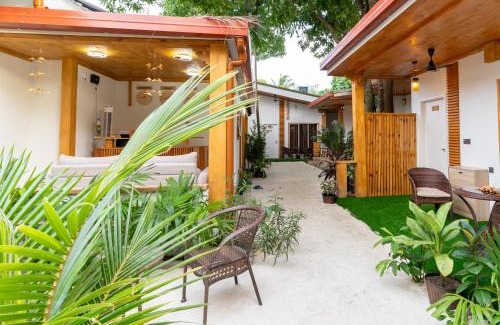 Ukulhas Hotel | Experience Tropico Villa: Beachfront Bliss & 9.8 Rating