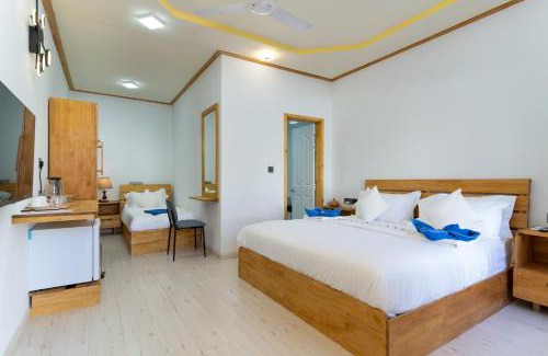 Ukulhas Hotel | Experience Tropico Villa: Beachfront Bliss & 9.8 Rating