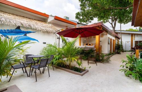 Ukulhas Hotel | Experience Tropico Villa: Beachfront Bliss & 9.8 Rating