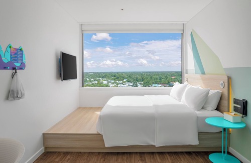 Vi Thanh Hotel | Exceptional SOJO Hotel Hau Giang with Pool & Family Amenities