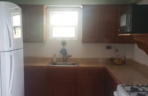Caye Caulker Apartment | Ocean View Ground Level Apartment with Exclusive Amenities