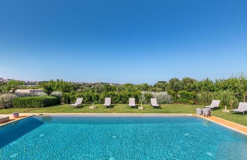Specchiaruzzo Villa | Discover Trulli Masci': Family-Friendly Retreat with Pool