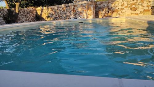 Castellana Grotte Villa | Trulli di Titti Country House: Oceanfront Bliss Awaits