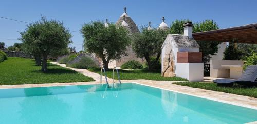 Martina Franca Villa | Relax at Trulli Terrarossa with Pool & Family-Friendly Fun