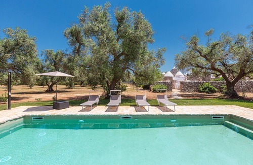 San Michele Salentino Cottage | Discover Trullo Palma: A Unique Family-Friendly Retreat