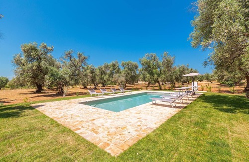 San Michele Salentino Cottage | Discover Trullo Palma: A Unique Family-Friendly Retreat