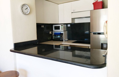 Playacar Fase I Condo | Oceanfront Penthouse Retreat in Playa del Carmen, Rated 10/10