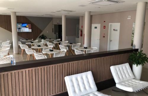 Porteirinha Hotel | Top-Rated TS HOTEL: Pet-Friendly & Family Welcome!