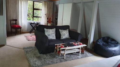 Storms River Cabin | Discover Tsitsikhaya Lodge: Oceanfront Retreat with Spa