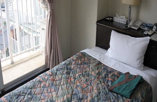 Oita Hotel | Eco-Friendly Tsurusaki Hotel with Spa and Family Amenities