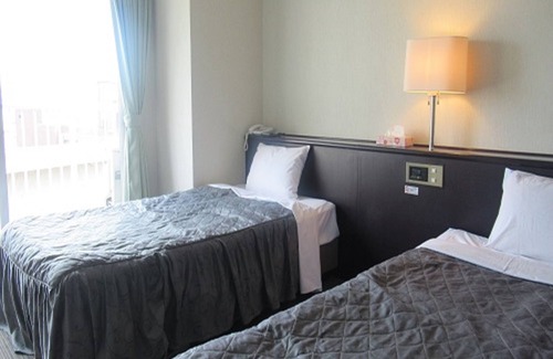 Oita Hotel | Eco-Friendly Tsurusaki Hotel with Spa and Family Amenities