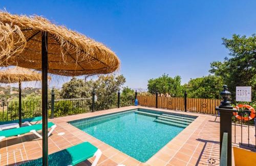 Alhaurin el Grande House | Relax at Tu Villa Rural: Family-Friendly with Ocean Views