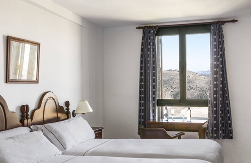 Zahara de la Sierra Hotel | Discover TUGASA Hotel Arco de la Villa: Spa & Family-Friendly