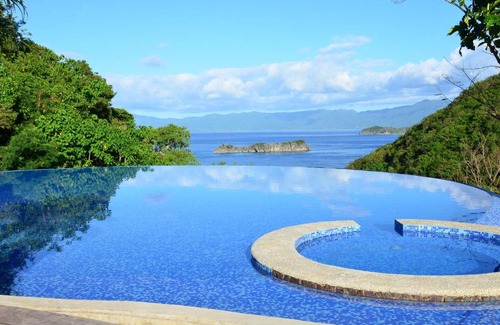 Caramoan Resort | Experience Tugawe Cove Resort: Beachfront Bliss Awaits