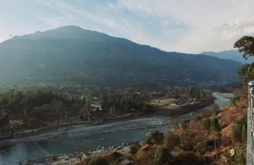 Mohal Hotel | Picturesque Tulip Flowing River View Hotel with Family Dining
