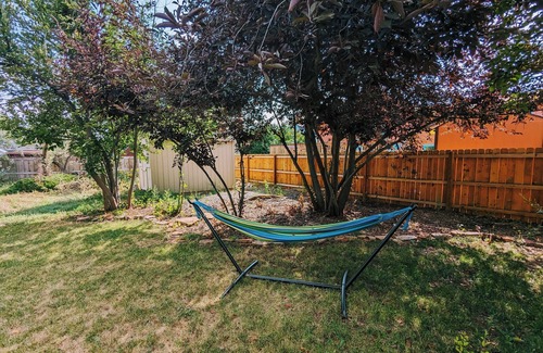 Longmont House | Tulip House: Inviting Retreat with Firepit & Bouldering Shed