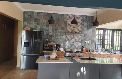 Moshi Apartment | Tulivu Escape: Room 3