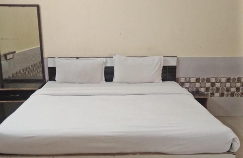 Vrindavan House | Budget-Friendly Tulsi Residency with Family Amenities