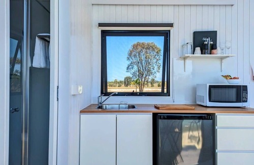 Burrum River House | Experience Turtle Island Lakeside Tiny House with Kitchen