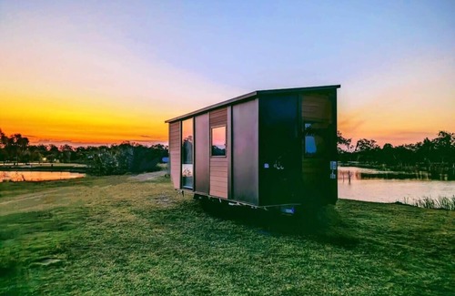 Burrum River House | Experience Turtle Island Lakeside Tiny House with Kitchen
