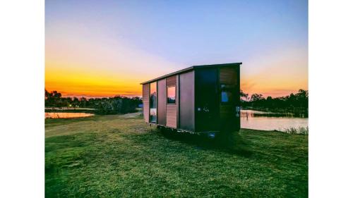 Burrum River House | Cozy Turtle Island Lakeside Tiny House - Rated 8.8/10