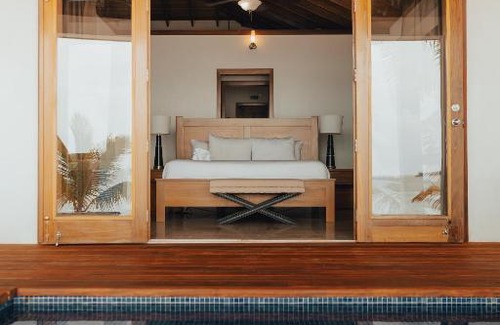 San Pedro Hotel | Discover Turtle Island Resort: Pet-Friendly Beach Getaway
