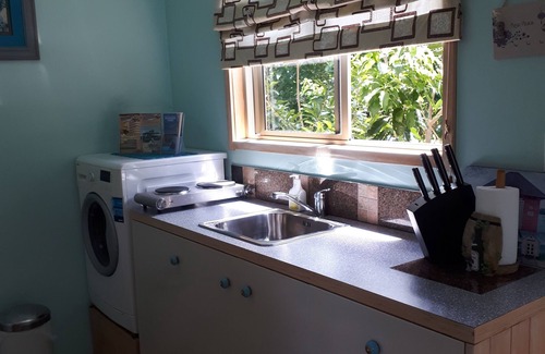 Whangarei Heads Ski Chalet | Idyllic Twin Palms Ocean Beach with Breakfast & Pet-Friendly Stays