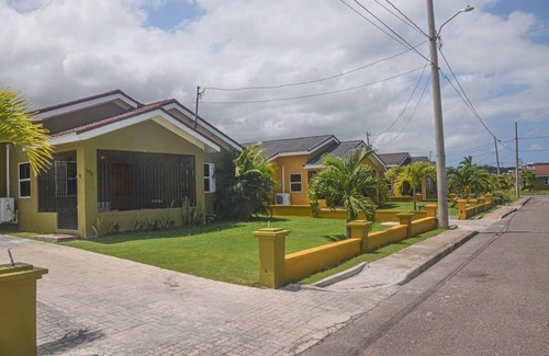 Mammee Bay House | Relax at Twin Peak Cottage: Family-Friendly with Pool & Breakfast