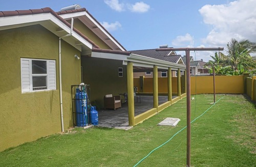 Mammee Bay House | Relax at Twin Peak Cottage: Family-Friendly with Pool & Breakfast