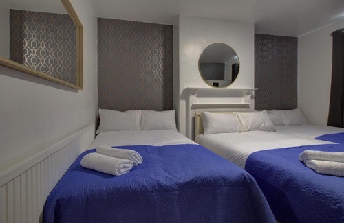 Dudden Hill House | Family-Friendly Twin Tower Hotel with Pet Amenities