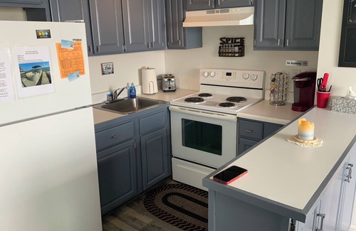 Manitou Beach-Devils Lake Cottage | Relax in Two Bedrooms with Sunrise Lakefront Views