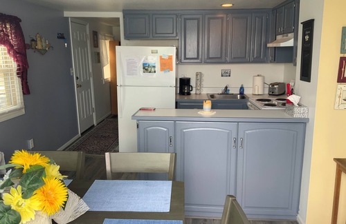 Manitou Beach-Devils Lake Cottage | Relax in Two Bedrooms with Sunrise Lakefront Views