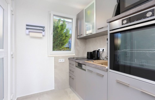 Okrug Donji Apartment | Idyllic Two-Bedroom Apartment Steps from Okrug Donji Beach