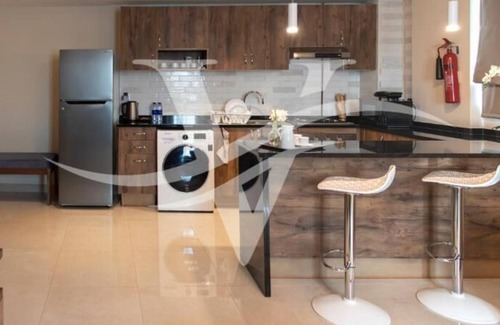 Sharjah Apartment | Two Bedroom Apartment with Hot Tub Near Ely Café