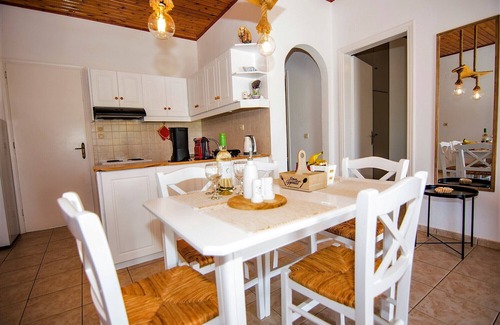 Ag. Georgios Apartment | Two Bedroom Apartment Steps from a Pristine Beach