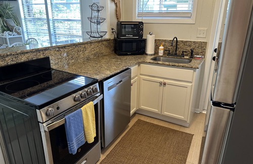 St. Petersburg - Clearwater Cottage | Top-Rated Two Bedroom Bungalow at Old FL Beach Cottage