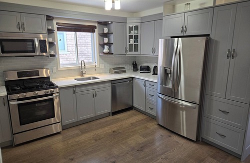 Burlington House | Two bedroom home next to golf course & a variety of restaurants