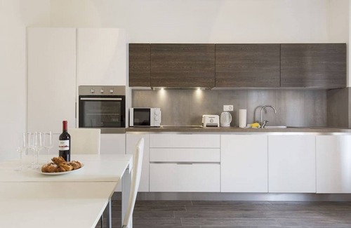 Lugano City-Centre Apartment | Ideal Two-Bedroom Retreat with Garden in Central Location