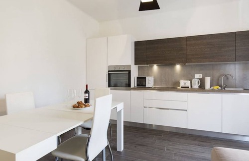 Lugano City-Centre Apartment | Ideal Two-Bedroom Retreat with Garden in Central Location