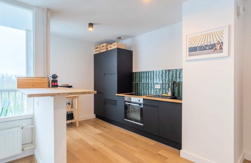 La Madeleine Apartment | Ideal Two-Bedroom Retreat with Balcony & Parking