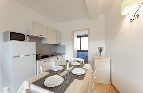 Aglientu Apartment | Pet-Friendly Retreat for 4 at Residence Baia dei Mirti