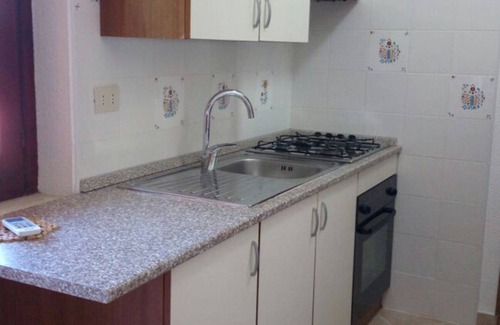 Costa Rei Villa | Beachside Two-Room Retreat with Ocean View and Amenities