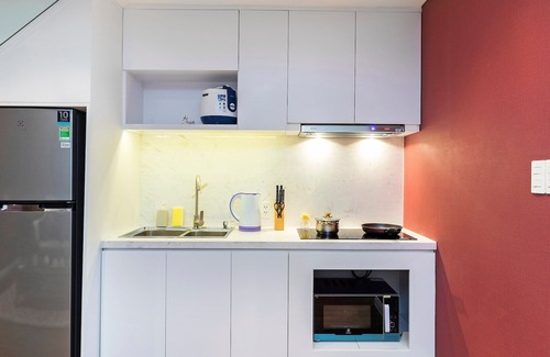 Nguyen Thai Binh Apartment | Charming Two-Storey Penthouse with Kitchen & Family Amenities