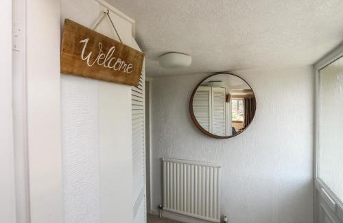Benllech House | Delightful Ty Bedw: 4-Star Stay with Pet and Child Amenities