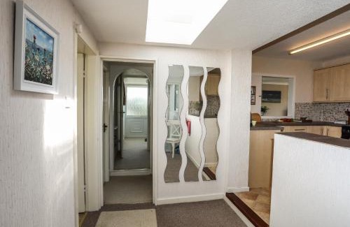 Benllech House | Delightful Ty Bedw: 4-Star Stay with Pet and Child Amenities