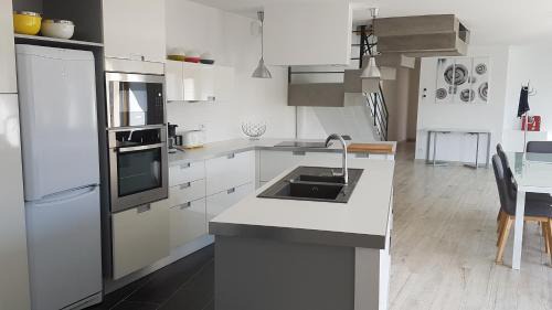 Baud Villa | Discover Ty Kousket: Family-Friendly Getaway with Pools