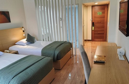 Klojen Hotel | Budget-Friendly Tychi Hotel with Pool and Family Amenities